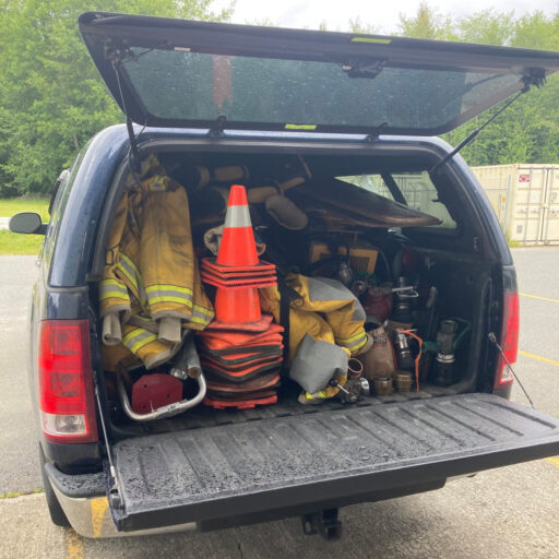 A truck full of firefighting gear.