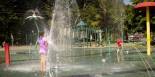 Kids play in a splash park