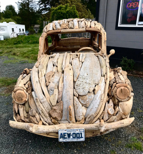 A Volkswagen Beetle made from driftwood.