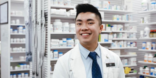 Pharmacist Riz Gumpac smiles in his pharmacy.