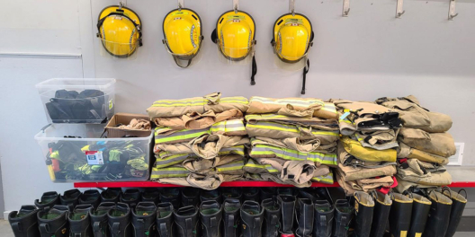 Fire fighter gear sits nicely folded and arranged before being shipped to Ukraine.