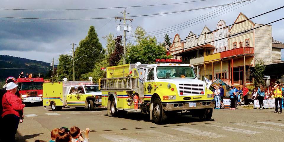 Cumberland's now-deceased bush truck follows a bigger engine at a parade.