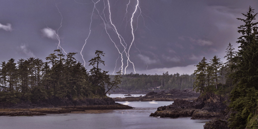 Bolts of lightning streak down charcoal skies in Ucluelet.