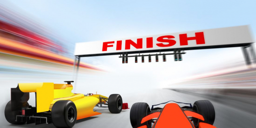 A cartoon of race cars zooming toward a finish line.