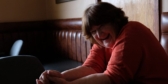 Picture of Patricia Gwynne in the pub, laughing