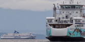 Two BC Ferries on the move off the Little River terminal.