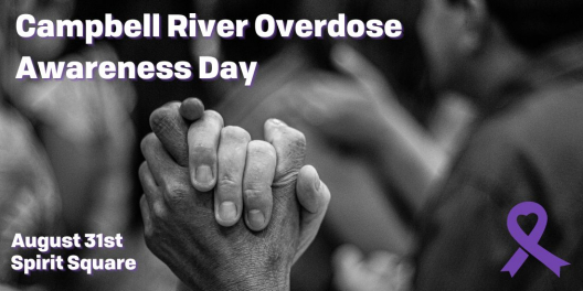A black-and-white photo of two hands clasped with the words "Campbell River Overdose Awareness Day."