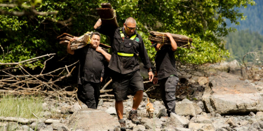 Tla-o-qui-aht Tribal Park Guardians maintaining the Big Tree Trail at Meares Island, B.C.