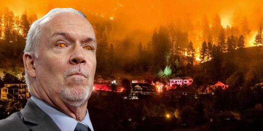 A picture of John Horgan superimposed over a forest fire with houses burning. His eyes are erased to show the flames behind him.