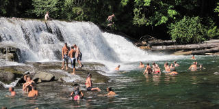 People play in Stotan Falls in 2009 when the area was still open to the public.